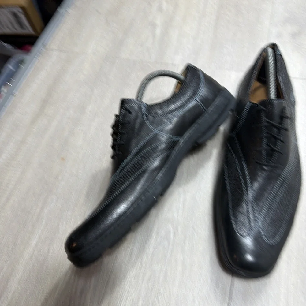 Toschi mens preowned